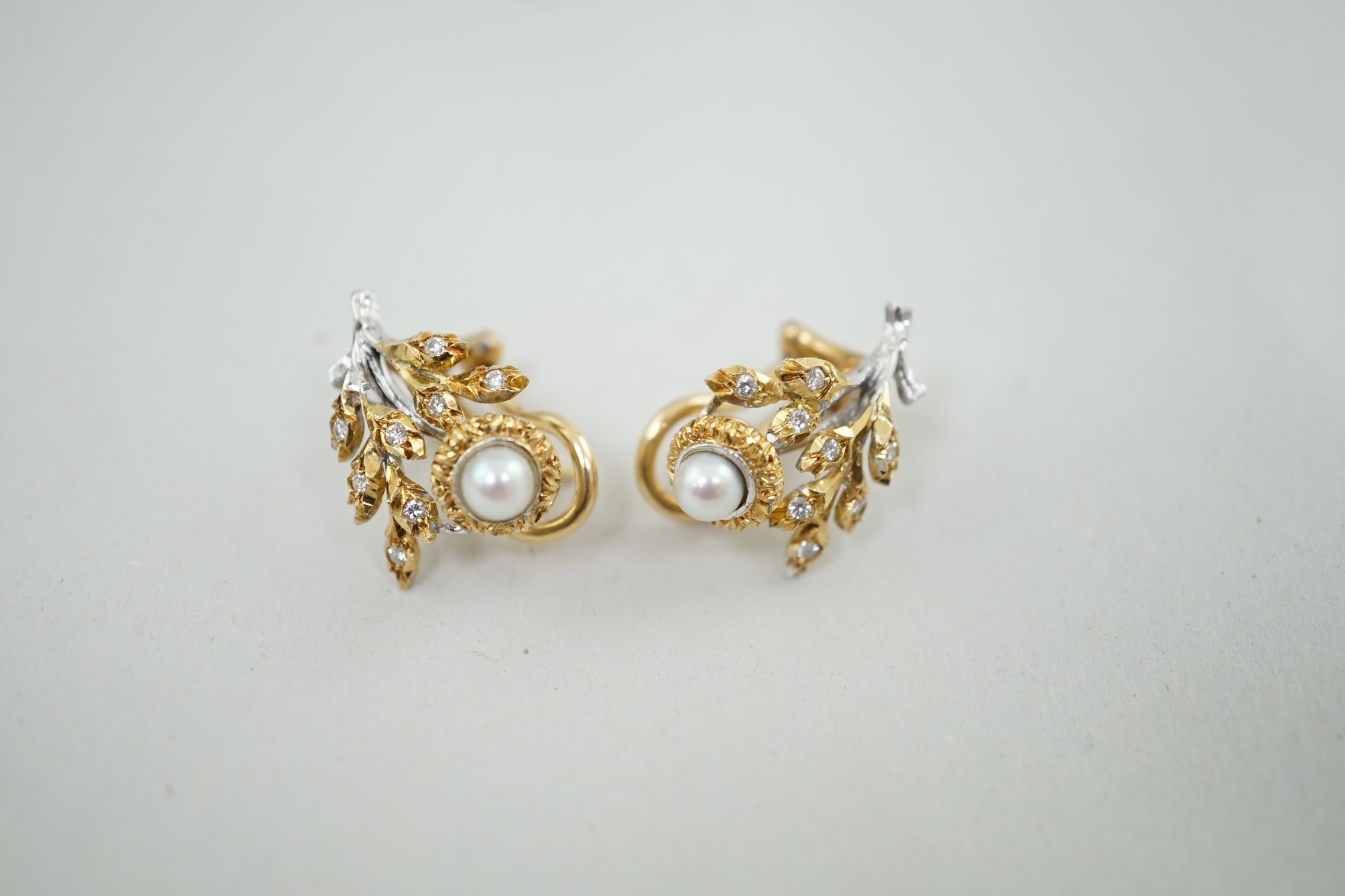 A pair of 1990's Italian Frederico Buccellati 18k gold, single stone pearl and diamond cluster set earrings